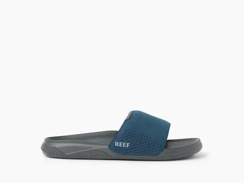 Outfit surfero hombre con chanclas REEF para verano y playa