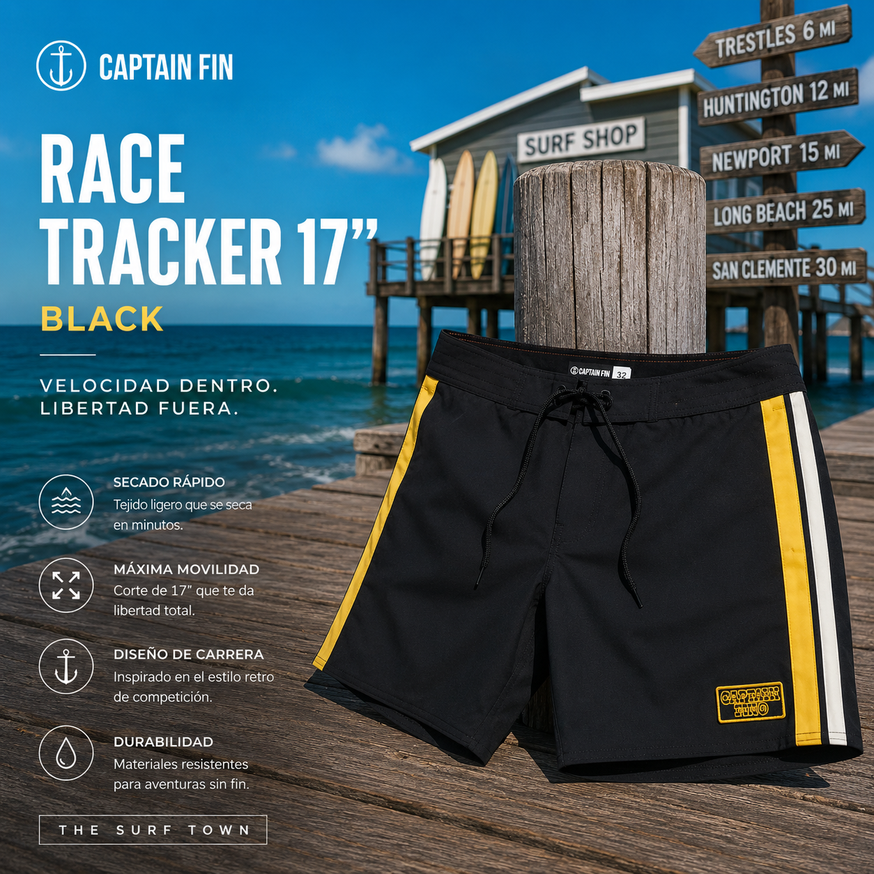 Bañador Captain Fin Race Tracker 17 Black sobre muelle oceánico de madera con estilo surf retro y ambiente premium