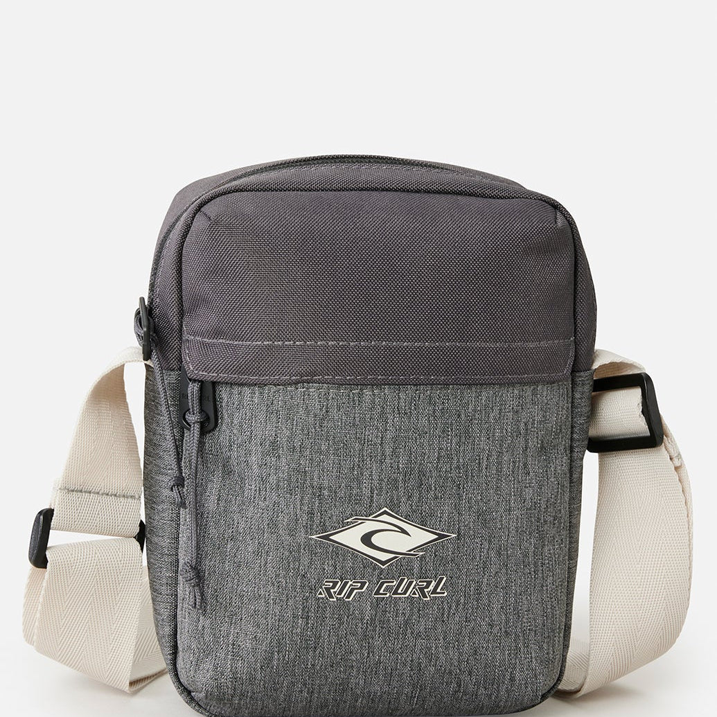 Bandolera RIP CURL No Idea Pouch Grey Heather unisex compacta gris con correa ajustable