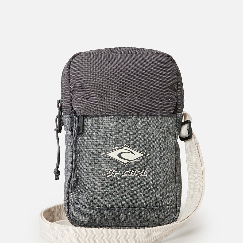 Bandolera RIP CURL Slim Pouch Search Grey Heather compacta gris con correa ajustable