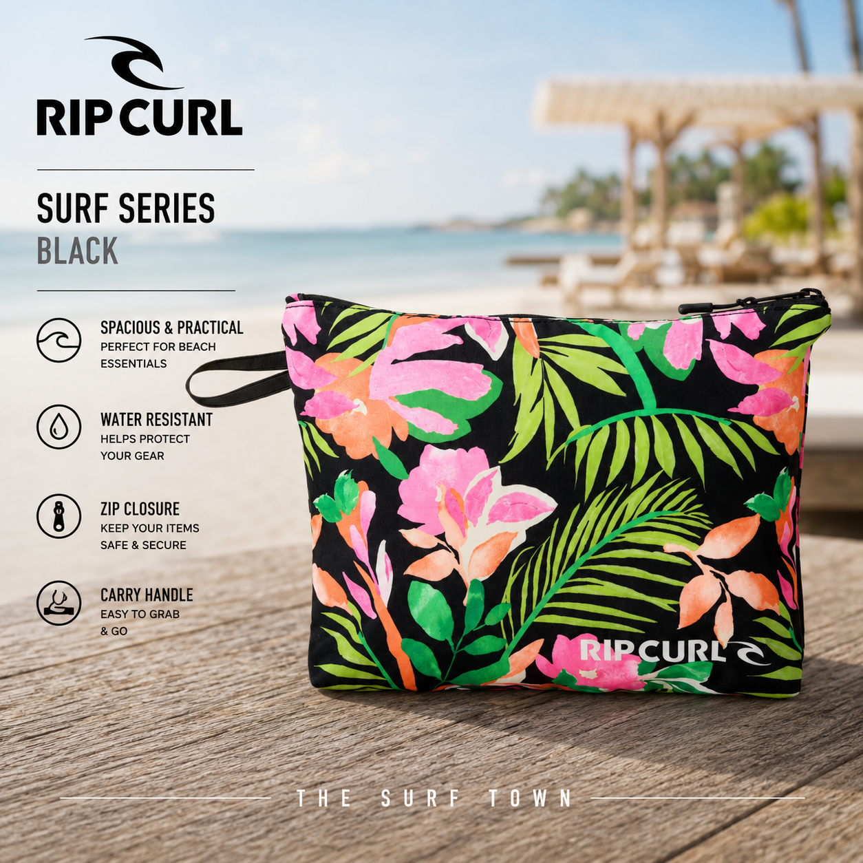 Bolsa Rip Curl Surf Series Black en fotografía editorial propia de THE SURF TOWN en beach club tropical premium con estampado floral, cierre de cremallera y diseño práctico para playa, viajes y accesorios de surf.