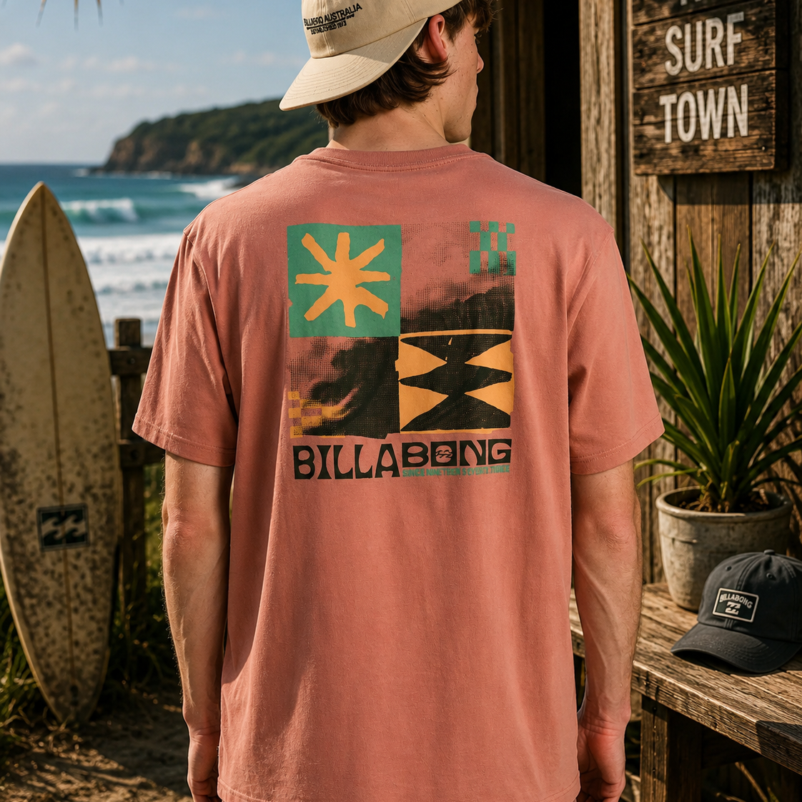 Camiseta Billabong rosa hombre con estampado trasero estilo surf lifestyle premium junto al mar