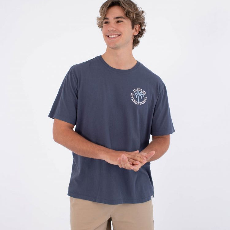 Camiseta Hurley Palm Monsoon hombre azul con logo frontal y estampado trasero estilo surf