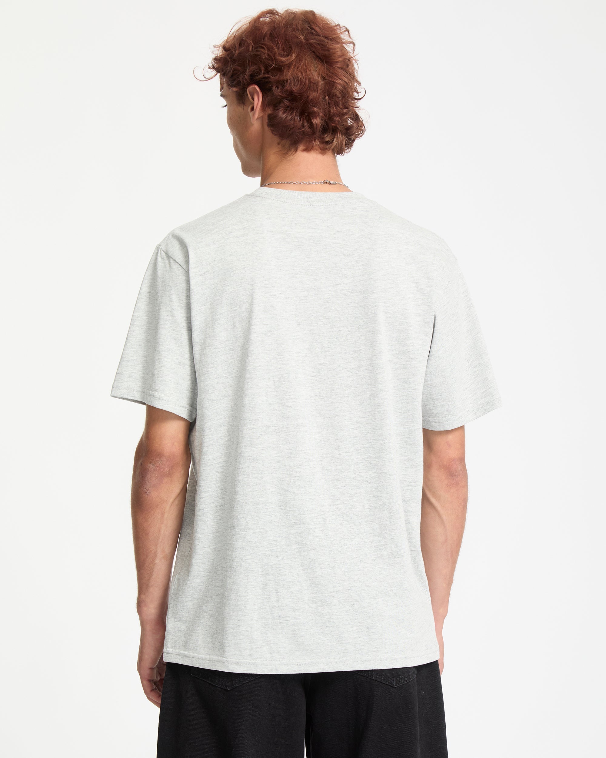 Camiseta Volcom Stone Blanks Heather Grey vista trasera con modelo oficial