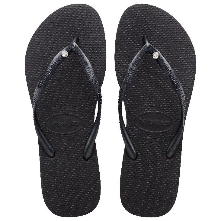 Chanclas Havaianas Slim Crystal Black mujer negras con tiras finas y detalle de cristal sobre suela cómoda de goma ideales para verano, playa y piscina