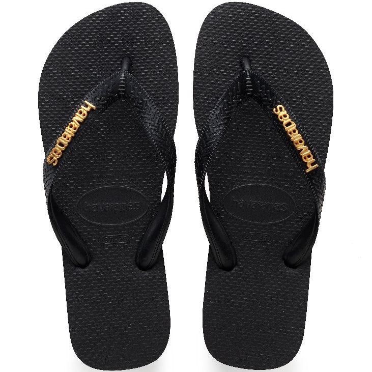 Chanclas Havaianas Top Logo Metallic Black negras con logo metálico dorado en las tiras y suela cómoda de goma para verano, playa y piscina