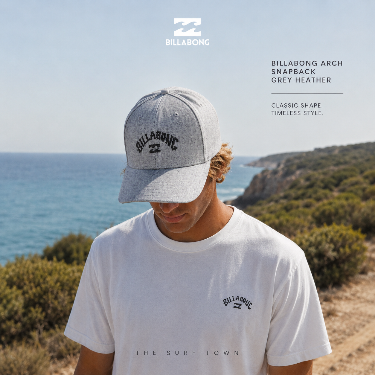 Gorra Billabong Arch Snapback Grey Heather en fotografía editorial propia de THE SURF TOWN sobre sendero costero mediterráneo con luz natural y estilo surf lifestyle premium