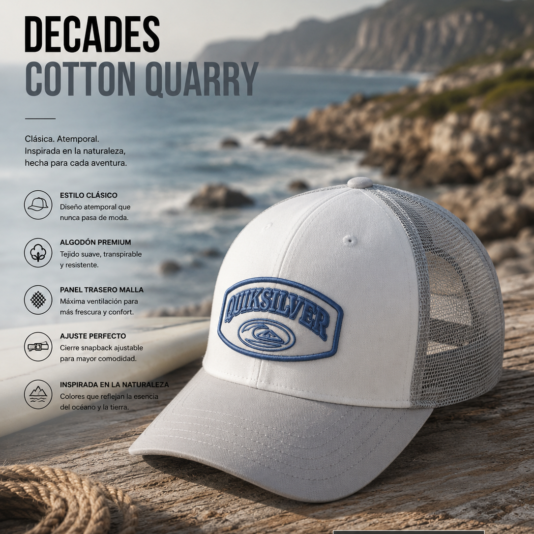 Gorra Quiksilver Decades Cotton Quarry blanca y gris con parche bordado en escena editorial coastal surf premium