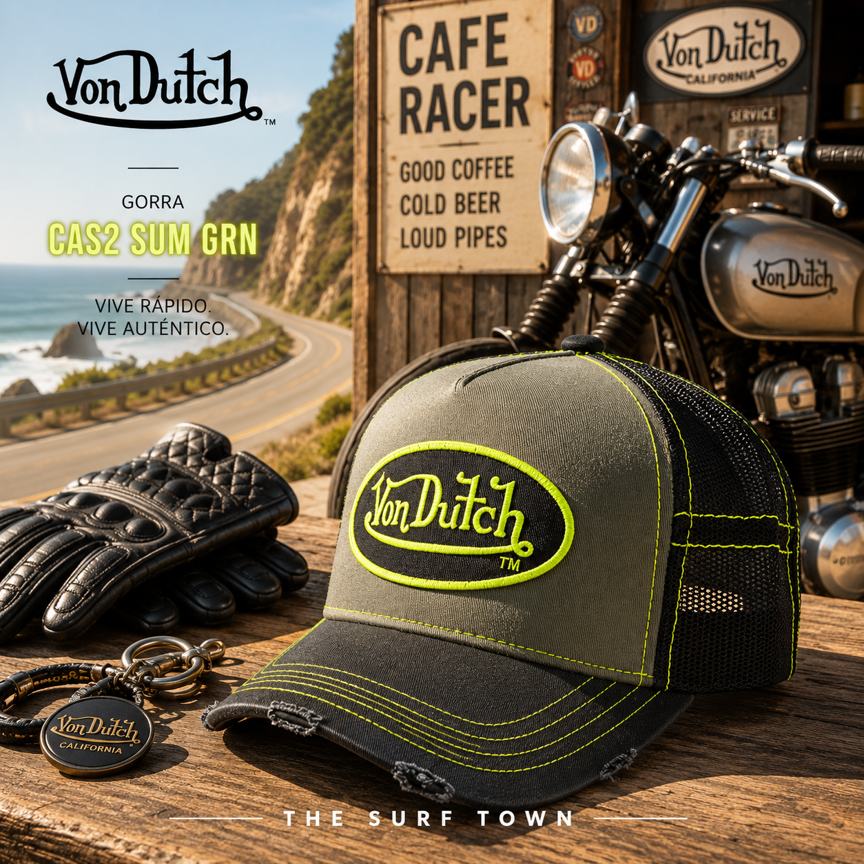 Gorra Von Dutch CAS2 Sum Grn en fotografía editorial propia de THE SURF TOWN en ambiente cafe racer junto a moto clásica y carretera costera, estilo vintage California road trip con inspiración motera americana.