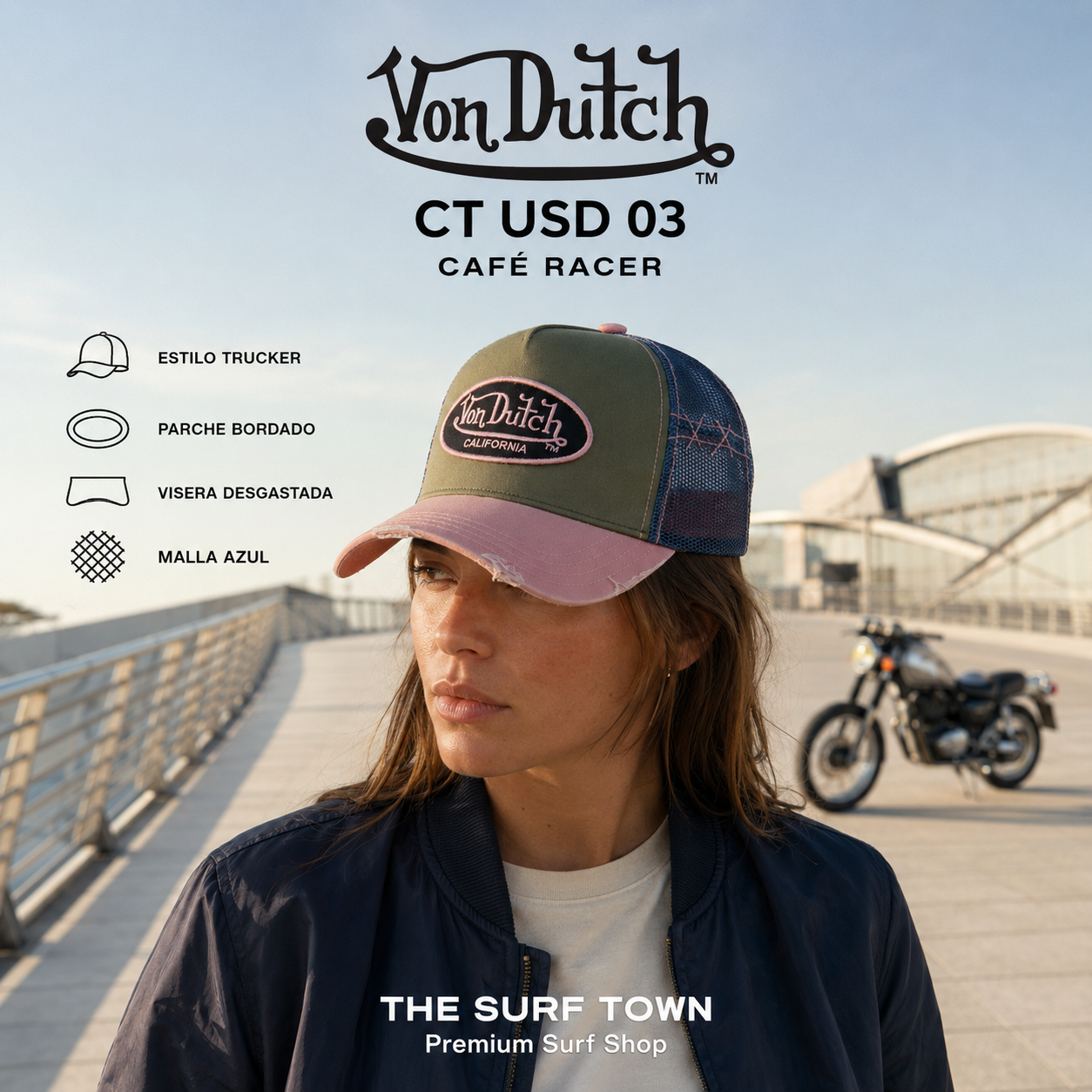 Mujer con Gorra Von Dutch CT USD 03 en una imagen editorial propia de THE SURF TOWN con estética café racer en un puente con una moto