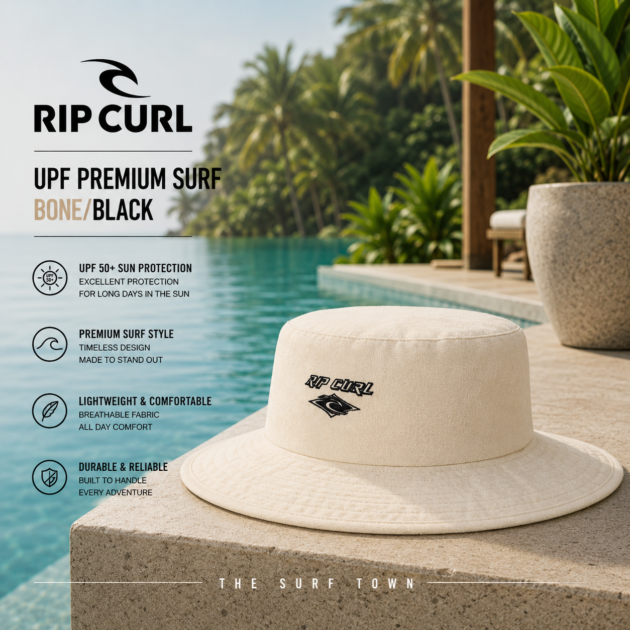 Gorro Rip Curl UPF Premium Surf Bone Black en fotografía editorial propia de THE SURF TOWN junto a piscina infinity tropical con protección solar UPF 50+, diseño surf premium y estilo outdoor para playa, viajes y actividades al aire libre.