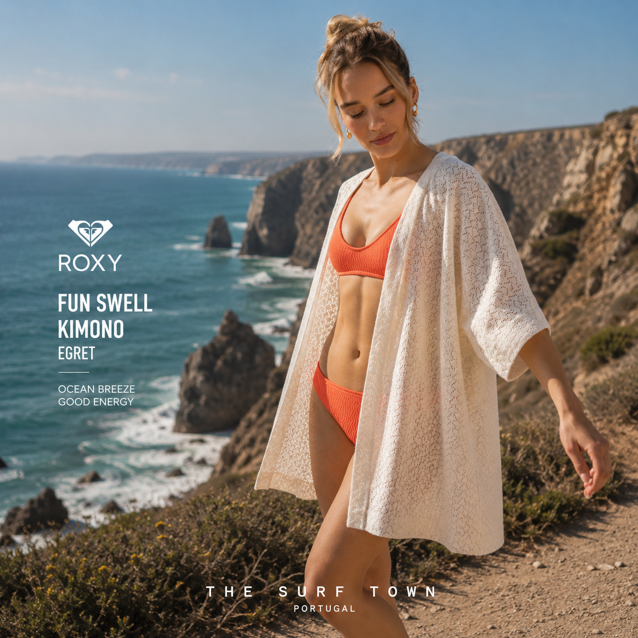 Fotografía propia de THE SURF TOWN del kimono Roxy Fun Swell Egret para mujer en los acantilados oceánicos de Portugal con vistas al Atlántico y ambiente surf lifestyle premium.
