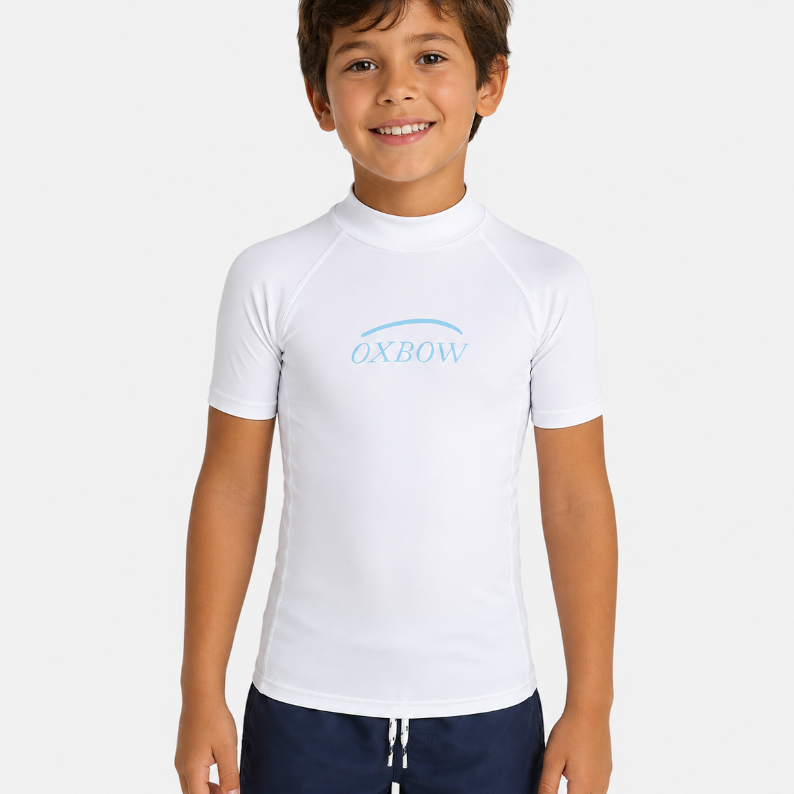 Licra Oxbow blanca de niño para surf y playa con protección UV y manga corta estilo surfwear verano Costa del Sol