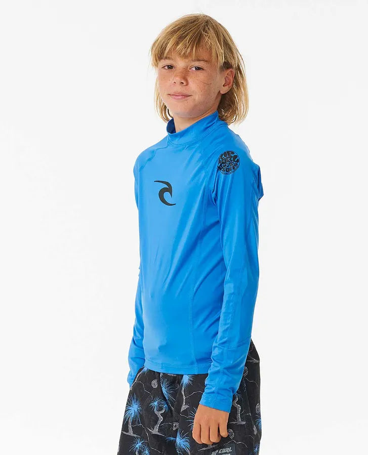 Licra de surf para niño de mangas largas de la marca Rip Curl en color azul royal con logo negro en pecho y hombro. Protección UPF 50