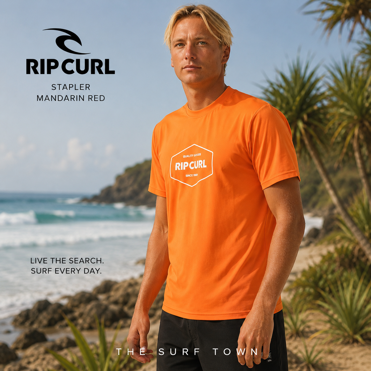 Licra Rip Curl Stapler Mandarin Red en fotografía editorial propia de THE SURF TOWN junto a olas y costa tropical en surf trip premium