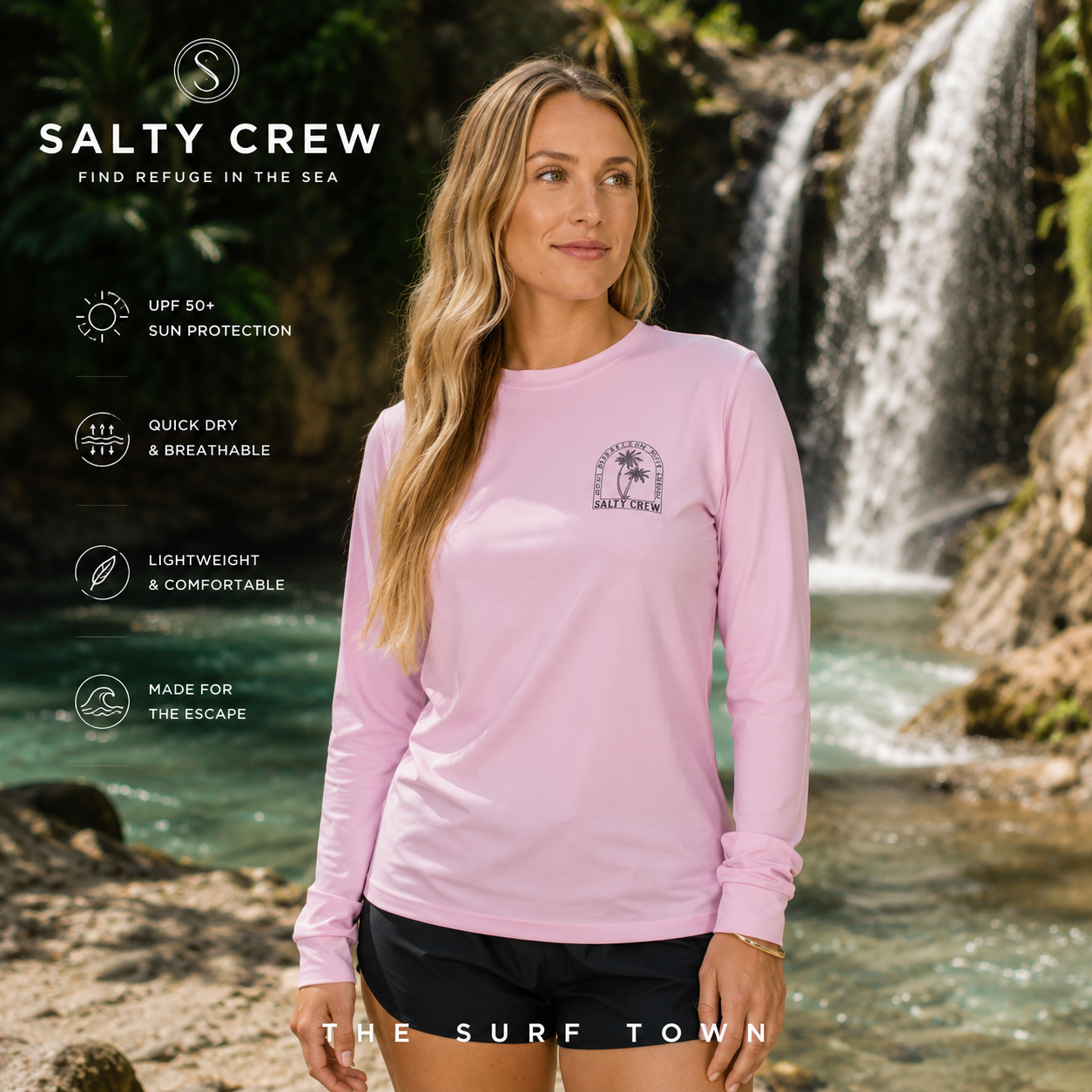 Licra Salty Crew Archway Sunshirt Pink Skies en cascada tropical exclusiva, fotografía editorial propia de THE SURF TOWN con modelo lifestyle femenino, protección solar UPF y estilo beachwear premium
