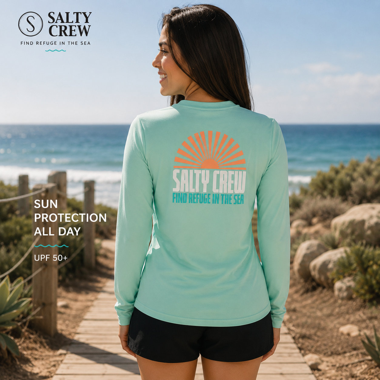 Licra Salty Crew In The Rays Sun Mint para mujer con protección solar UPF en escenario surf lifestyle junto al mar