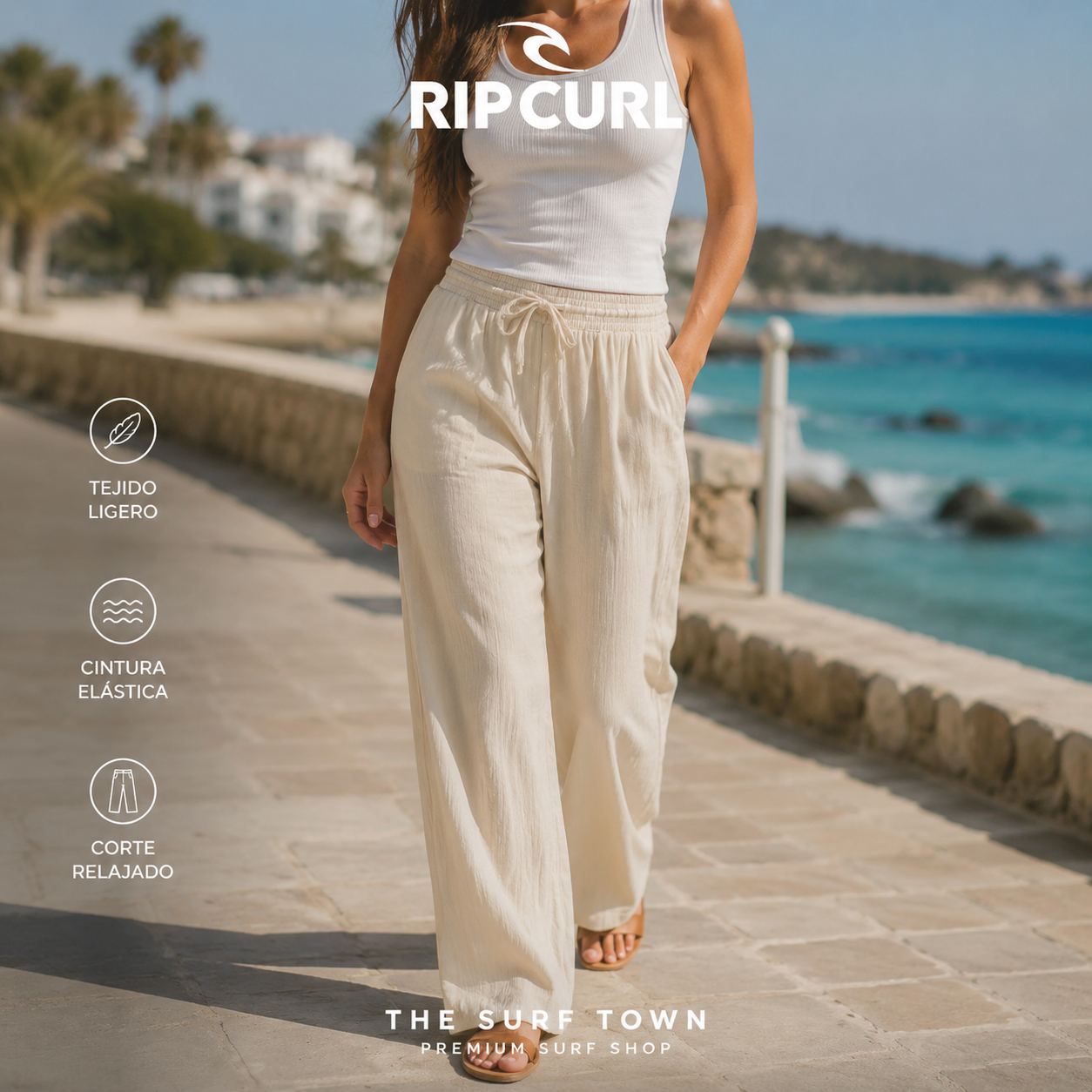 Pantalón Rip Curl AZ Classic Natural para mujer en una escena vacacional junto al mar, imagen editorial propia de THE SURF TOWN