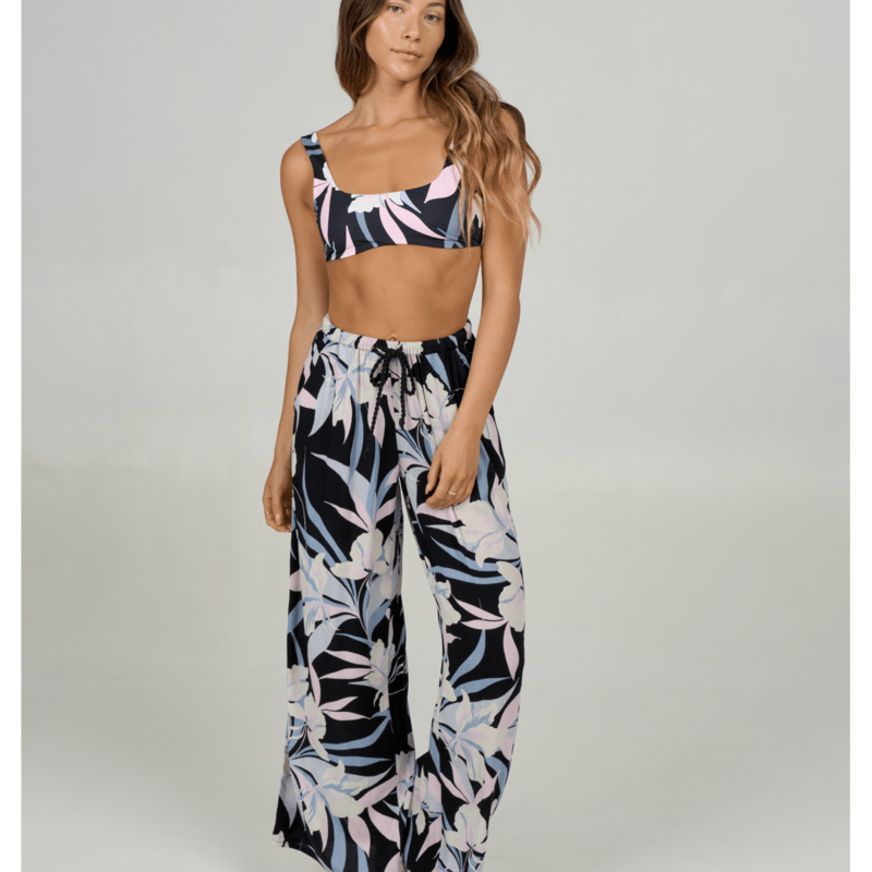 Pantalones Salty Crew Dreamland Beach Pant Black para mujer con estampado tropical, corte amplio y estilo costero para verano