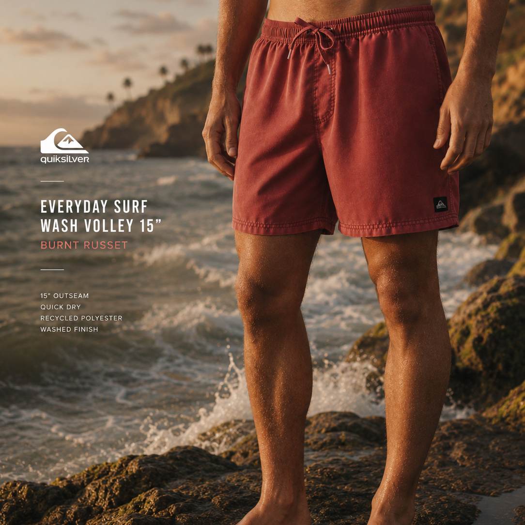 Bañador Quiksilver Everyday Surf Wash Volley 15 Burnt Russet para hombre en escenario surf premium cinematográfico sobre rocas junto al mar al atardecer
