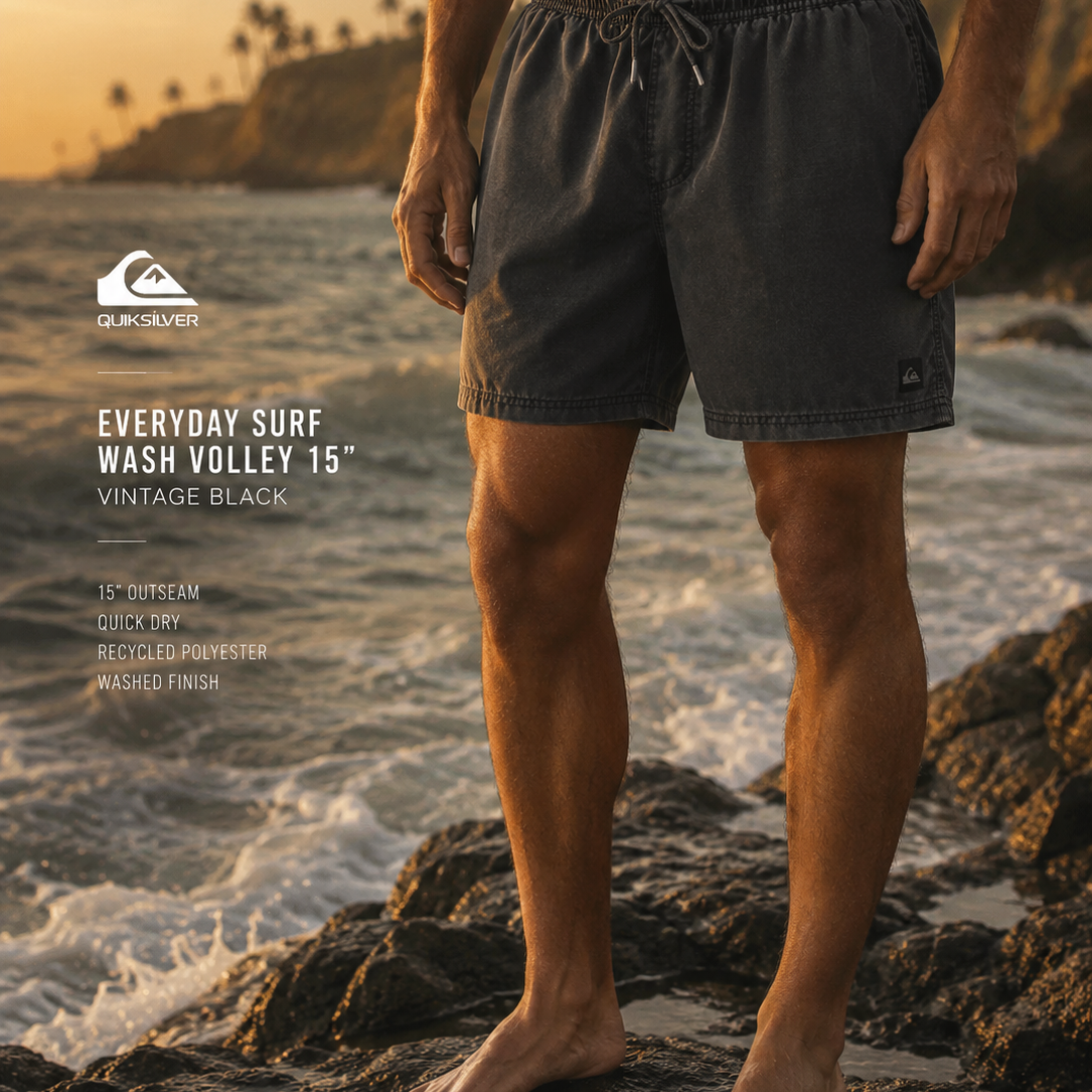 Bañador Quiksilver Everyday Surf Wash Volley 15 Vintage Black para hombre en escenario surf editorial premium sobre rocas junto al mar al atardecer