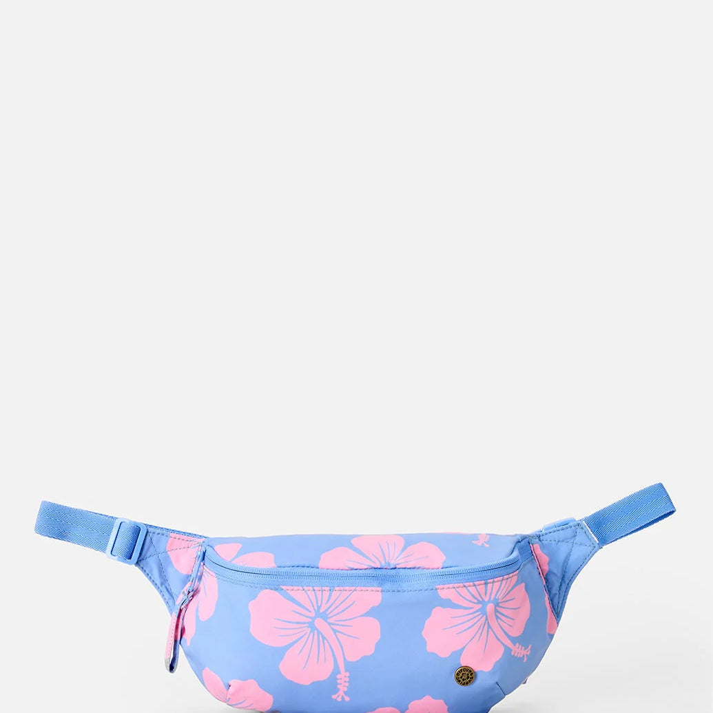 Riñonera Rip Curl Everyday Belt Bag Blue con estampado floral tropical azul y rosa para viajes, playa y estilo surf lifestyle