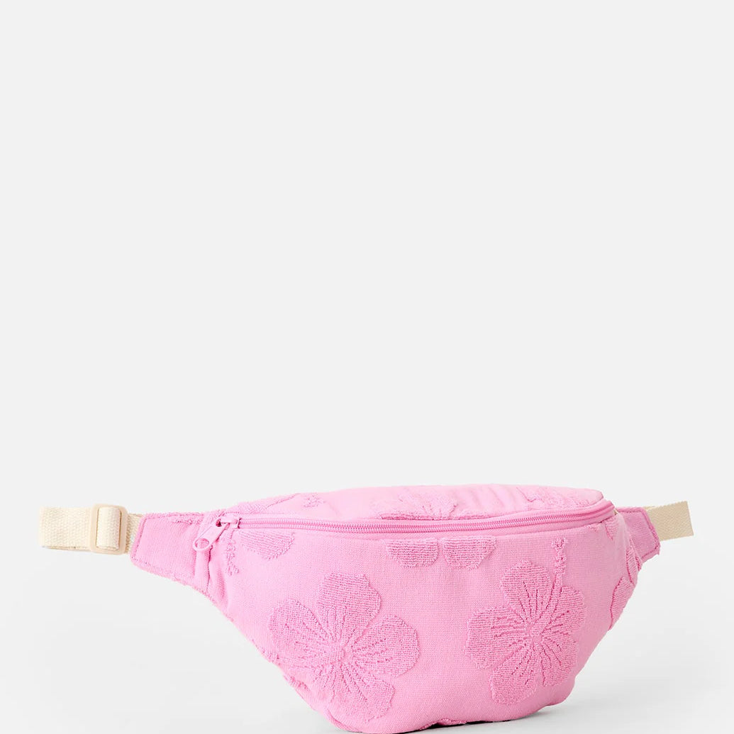 Riñonera Rip Curl Rip Mixed Terry Pink color rosa con textura terry para playa, vacaciones y estilo surf lifestyle