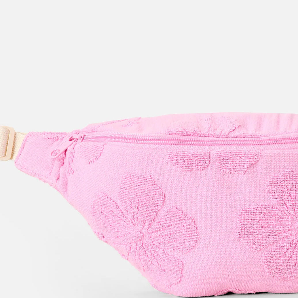 Riñonera Rip Curl Rip Mixed Terry Pink color rosa con textura terry para playa, vacaciones y estilo surf lifestyle