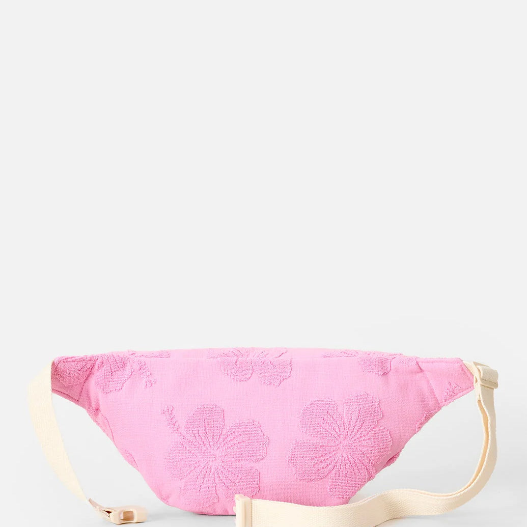 Riñonera Rip Curl Rip Mixed Terry Pink color rosa con textura terry para playa, vacaciones y estilo surf lifestyle