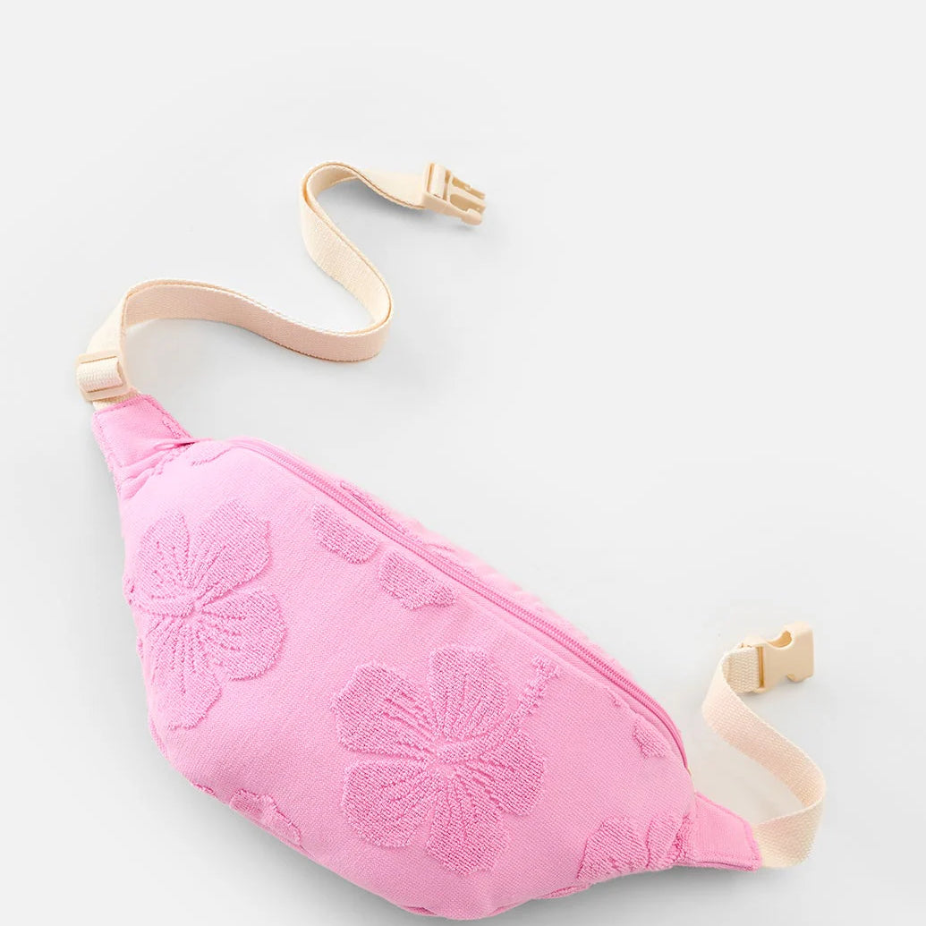 Riñonera Rip Curl Rip Mixed Terry Pink color rosa con textura terry para playa, vacaciones y estilo surf lifestyle
