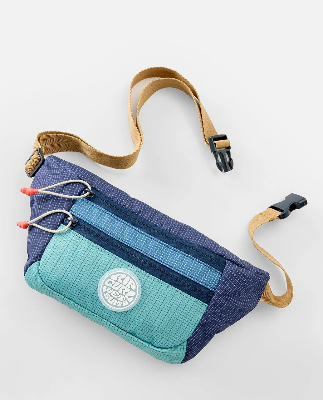 Riñonera Rip Curl Rip Waist Bag Multicolor en tonos azul y turquesa inspirados en el océano para viajes, playa y surf lifestyle