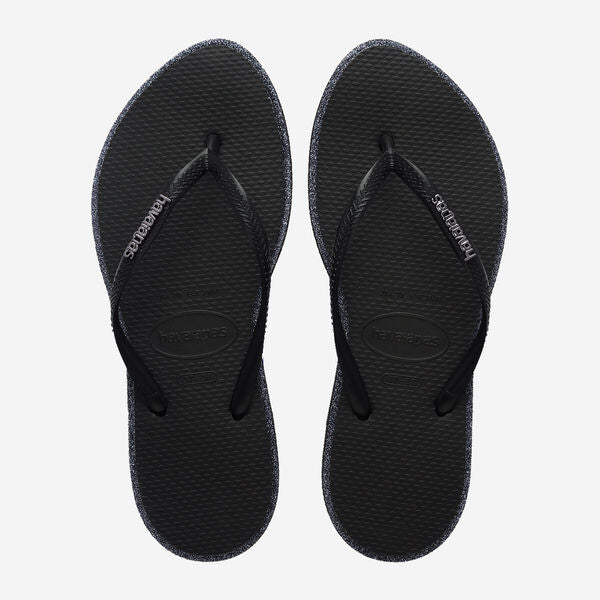 Sandalias Havaianas Slim Point Glitter Black mujer con tiras finas negras con brillo y suela de goma cómoda para playa, piscina o verano