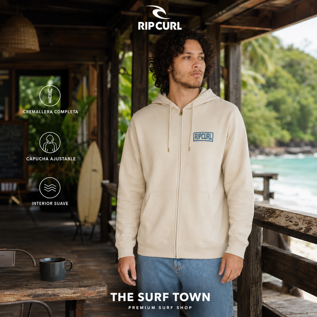 Sudadera Rip Curl Made For Zip Vintage White para hombre en una cafetería surf frente al mar, imagen editorial propia de THE SURF TOWN
