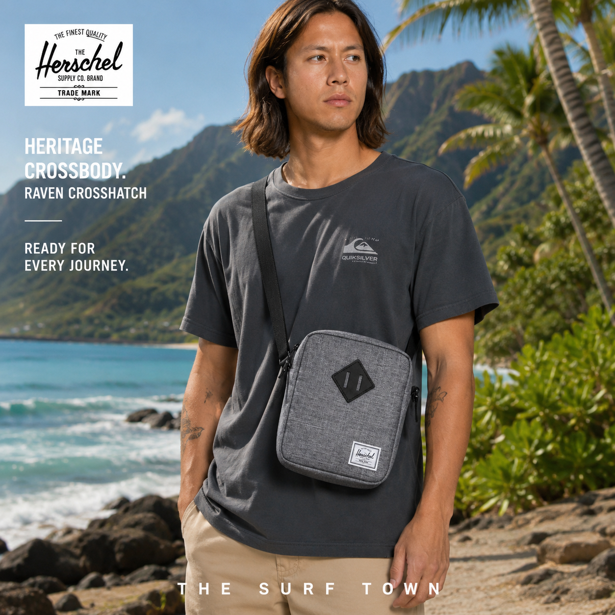 Bandolera Herschel Heritage Crossbody Raven Crosshatch en fotografía editorial propia de THE SURF TOWN en playa tropical de Hawái con luz natural diurna y estilo lifestyle premium