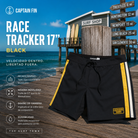 Bañador Captain Fin Race Tracker 17 Black sobre muelle oceánico de madera con estilo surf retro y ambiente premium