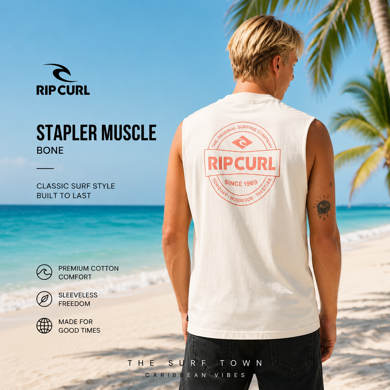 Fotografía propia de THE SURF TOWN de la camiseta sin mangas Rip Curl Stapler Muscle Bone para hombre en una playa caribeña de arena blanca, aguas turquesa y ambiente surf lifestyle premium.