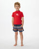 licra RIP CURL niño roja UPF 50 protección solar surf cómoda playa