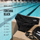 Fotografía propia de THE SURF TOWN del bañador de natación Billabong Fontana Black apoyado junto a una piscina olímpica con ambiente deportivo premium