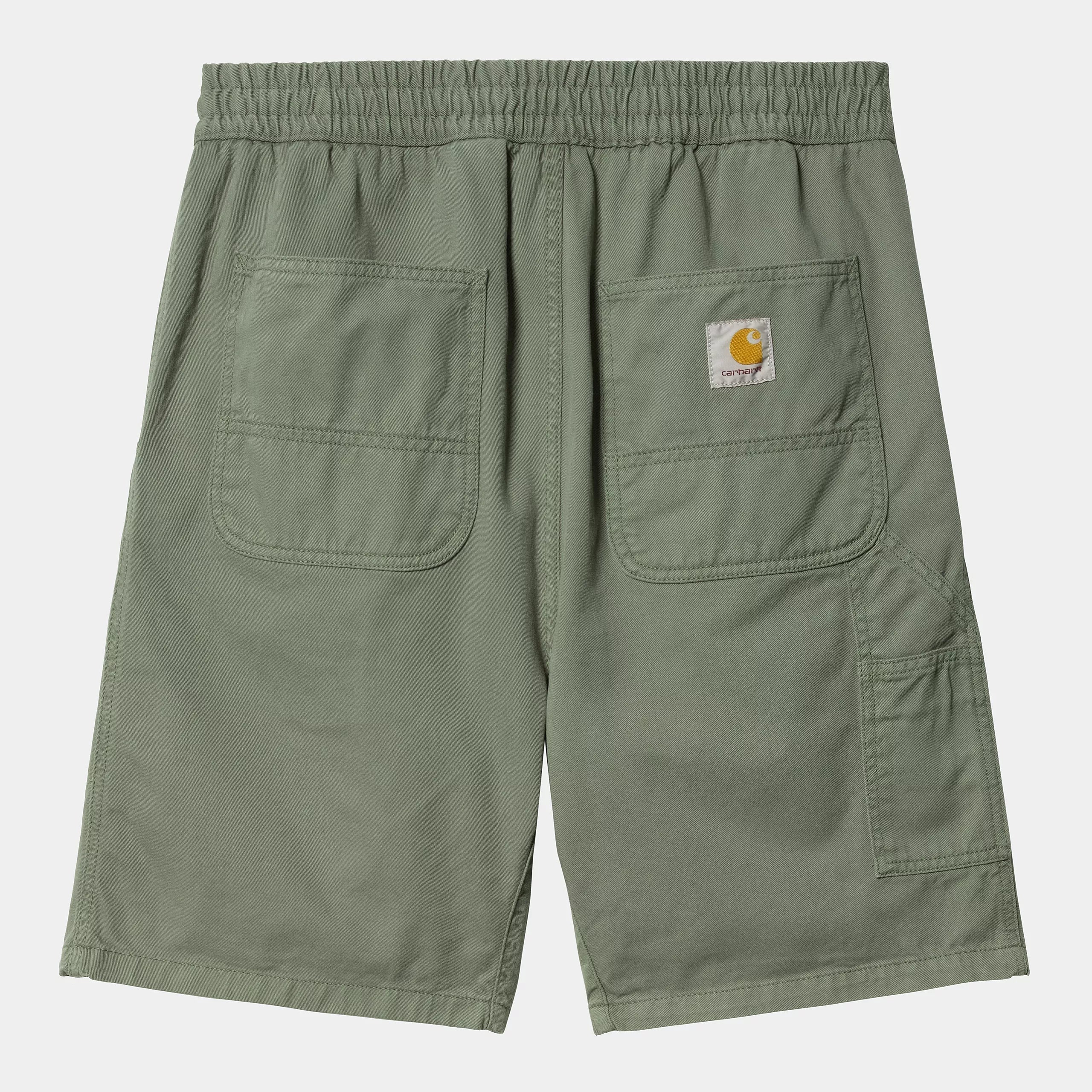 Bermudas Carhartt WIP Flint Short Park Garment Dyed verde con cintura elástica y parche Carhartt WIP en la parte trasera