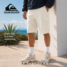 Bermudas Quiksilver MW Cargo Short Bone en fotografía editorial propia de THE SURF TOWN con estilo surf lifestyle premium y luz solar intensa