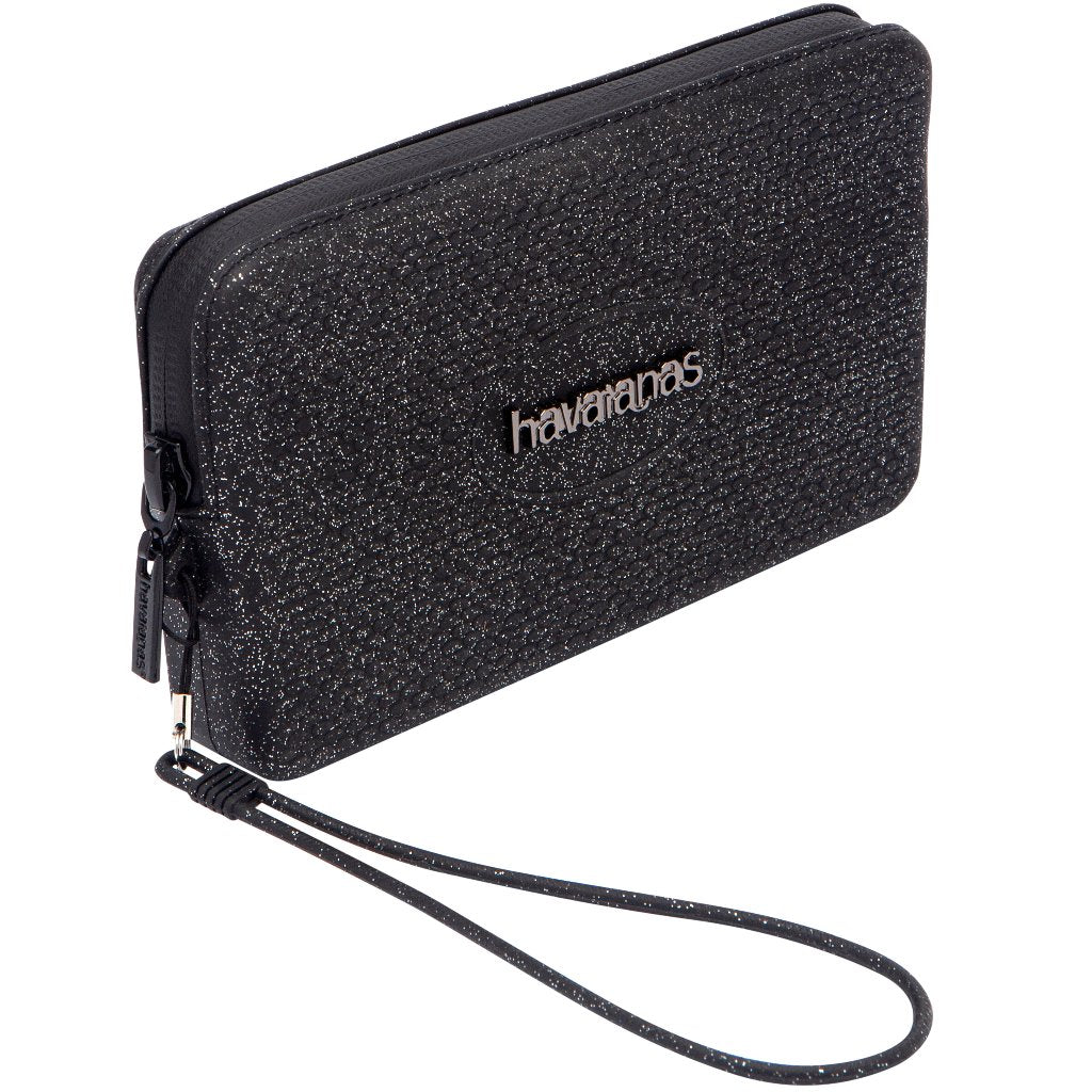 Bolsito Havaianas Mini Bag Plus Glitter negro con acabado brillante y cremallera ideal para llevar móvil, llaves y dinero en verano