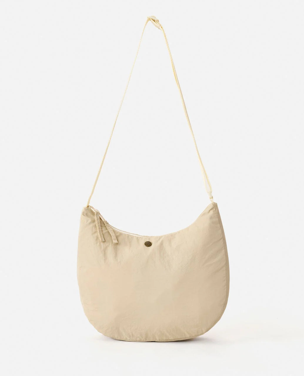 Bolso Rip Curl Everyday 8L Natural tipo bandolera en color beige para uso diario, viajes, playa y estilo surf lifestyle