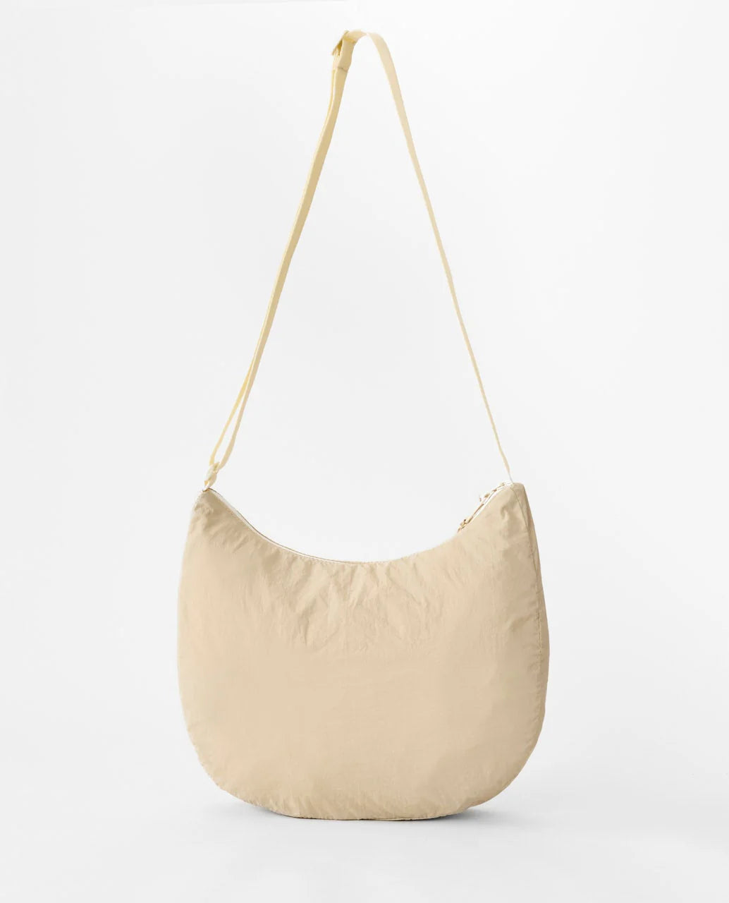 Bolso Rip Curl Everyday 8L Natural tipo bandolera en color beige para uso diario, viajes, playa y estilo surf lifestyle