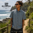 Camisa Billabong Surftrek Trail en fotografía editorial propia de THE SURF TOWN junto a olas y sendero costero en surf trip tropical premium