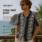 Camisa Carhartt WIP Floral Shirt Black en fotografía editorial propia de THE SURF TOWN, camisa estampada negra de manga corta con estilo surf lifestyle premium