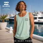 Camiseta de tirantes Billabong Crayon Wave Tank Seafoam para hombre en marina premium mediterránea con yates de lujo, fotografía editorial propia de THE SURF TOWN inspirada en el surf lifestyle internacional