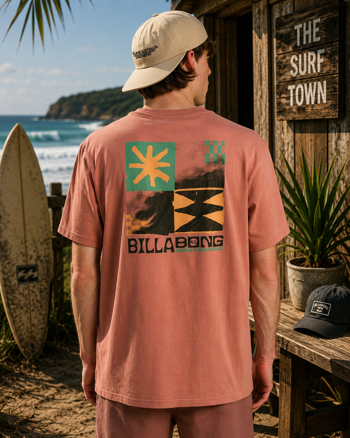 Camiseta Billabong rosa hombre con estampado trasero estilo surf lifestyle premium junto al mar