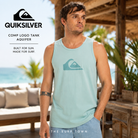 Camiseta Quiksilver Comp Logo Tank Aquifer para hombre en beach club tropical de Bali, fotografía editorial propia de THE SURF TOWN, camiseta de tirantes azul Aquifer con logo frontal Quiksilver.

Título del blog: