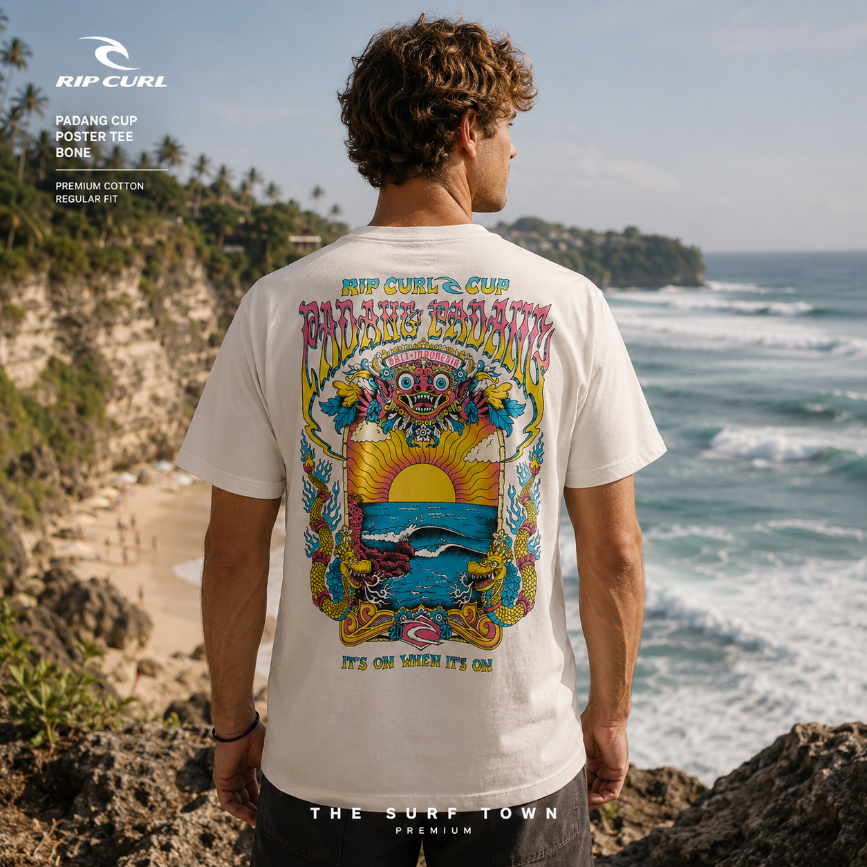 Camiseta Rip Curl Padang Cup Poster Bone con fotografía editorial propia de THE SURF TOWN en los acantilados de Padang Padang Bali frente a las olas de Indonesia