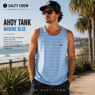 Imagen exclusiva creada por THE SURF TOWN de la camiseta de tirantes Salty Crew Ahoy Tank Marine Blue para hombre en entorno surf lifestyle premium junto al mar